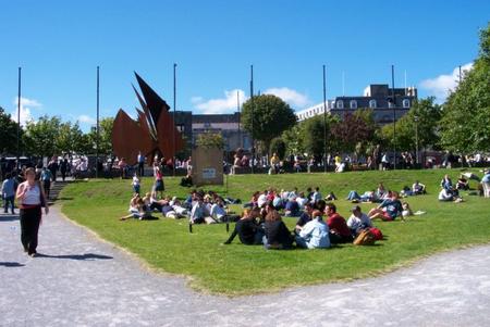 Galwegians enjoying a sunny day at Eyre Square, Galway.